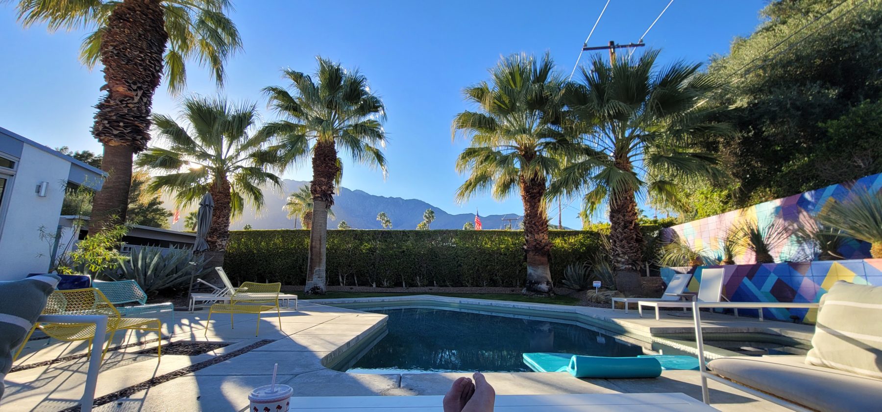 Grant sitting poolside in Palm Springs